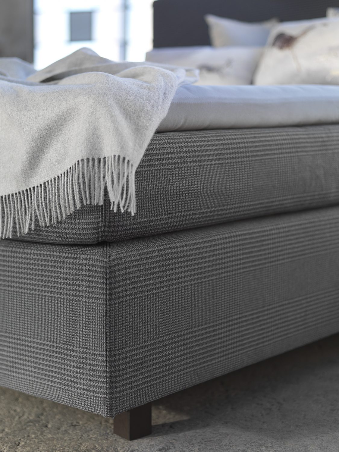 Boxspringbett Philrouge EOS inszeniert in grau und nahaufnahme des Stoff