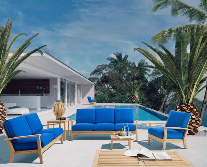 Arco Teak Gartenlounge mit blauen Polstern für die Terrasse